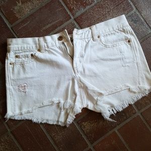 White ultra low waist jean shorts